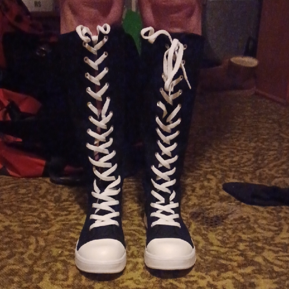 Black and White Lace Up Boots with Classic Design